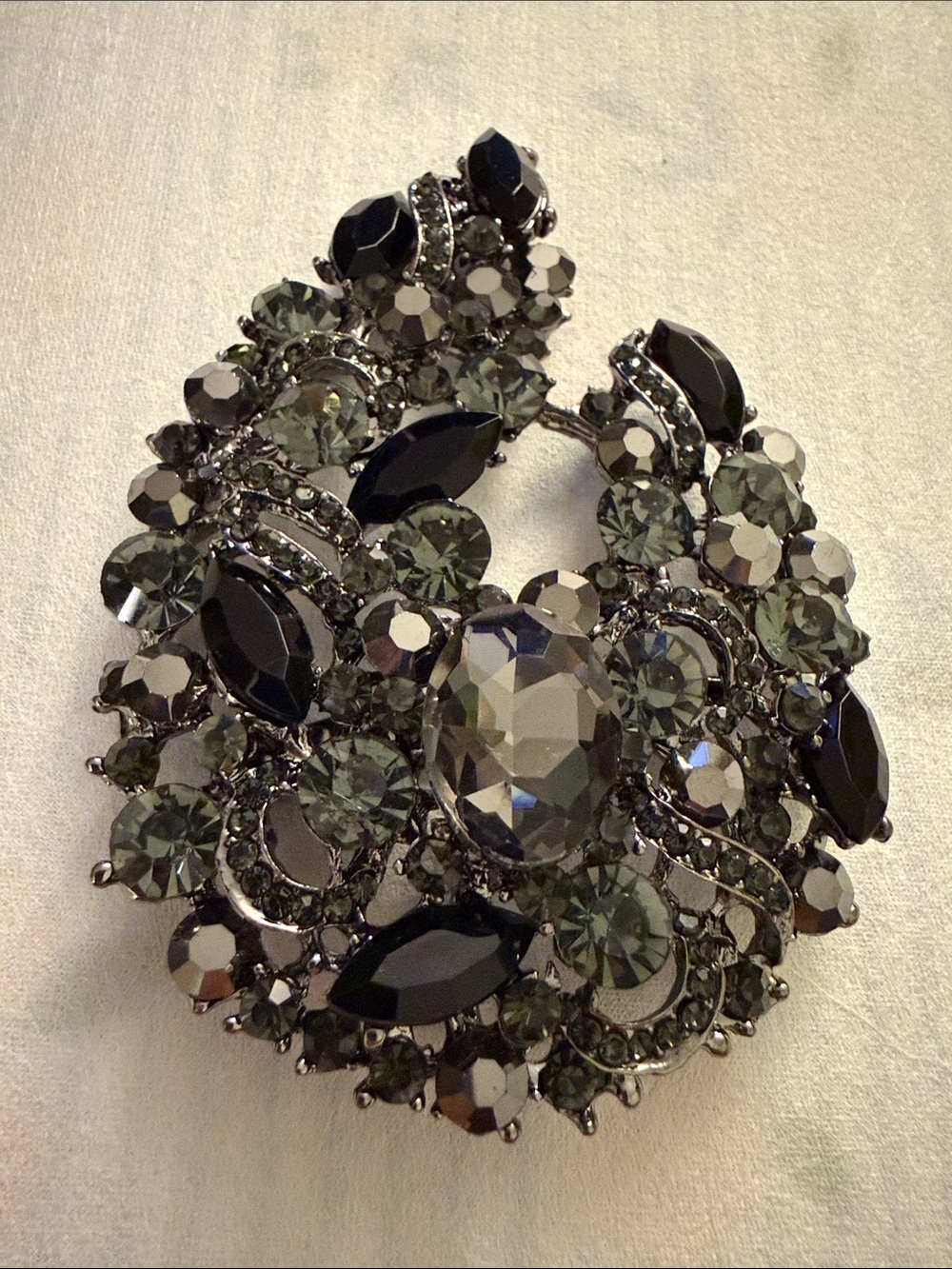 Gunmetal and Black Crystal Floral Brooch and a Pendant statement three tone